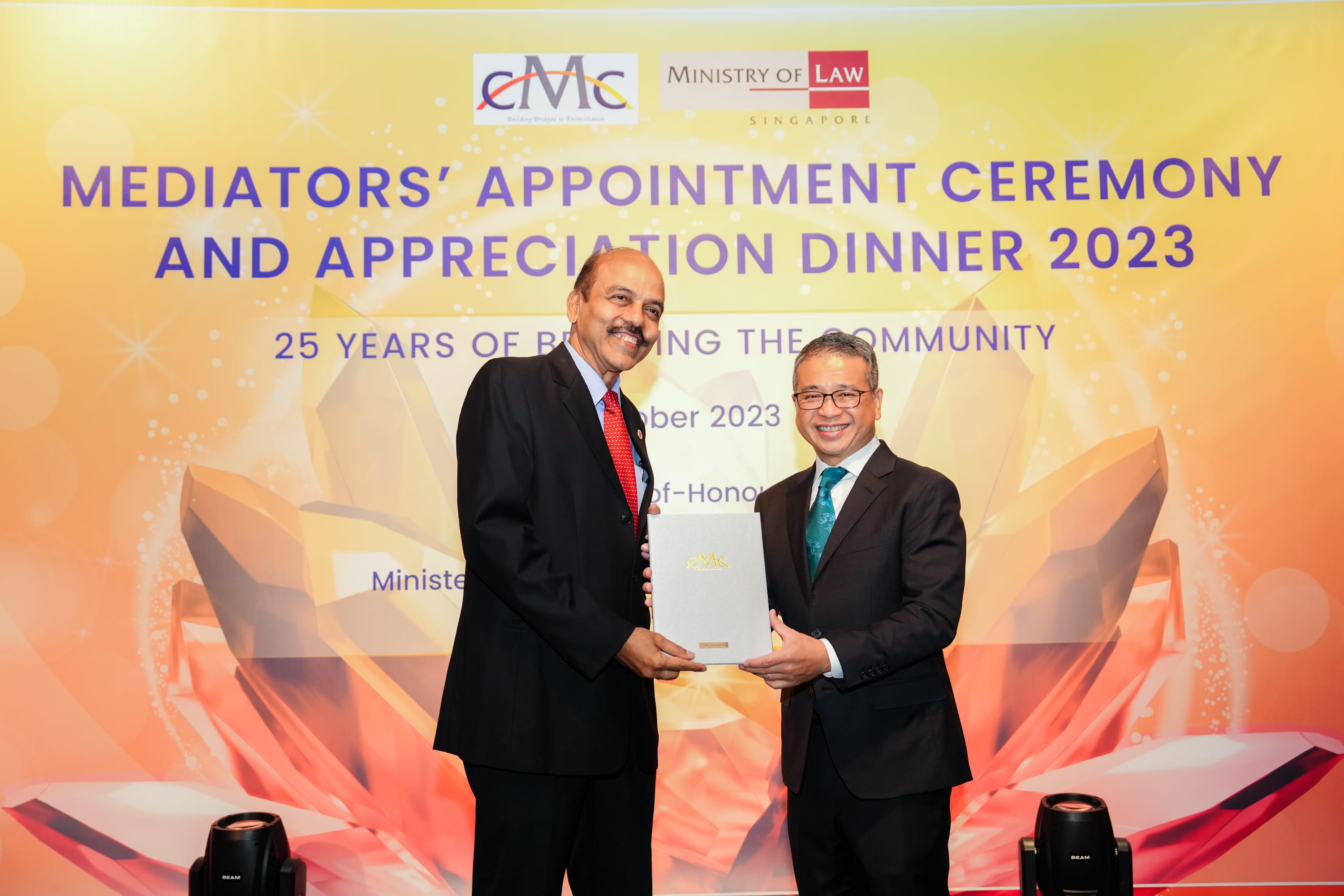re-appointment image 1 award with Min Edwin